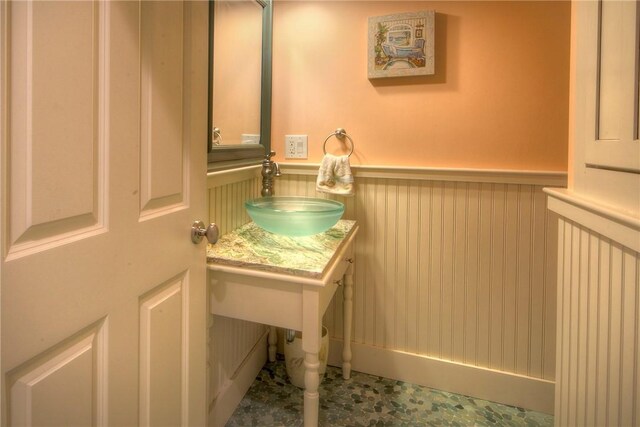 87 Waters Edge, Tiverton, RI 02878 - bathroom with wainscoting and a sink