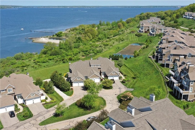 aerial view featuring a water view and a residential view