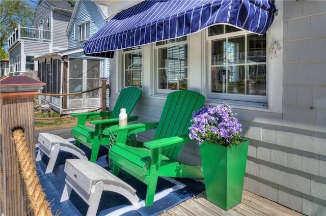 deck featuring a sunroom