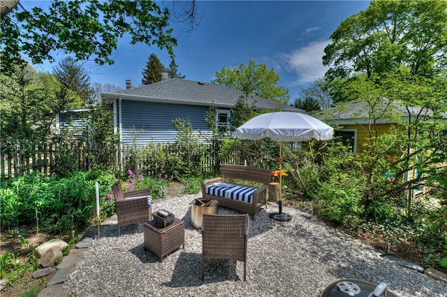 view of patio / terrace featuring fence