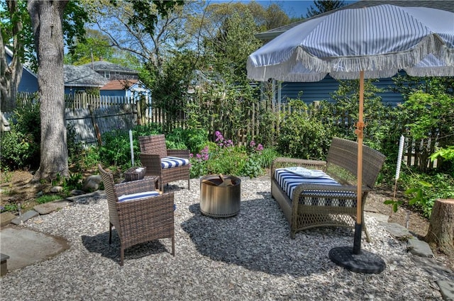 view of patio featuring fence