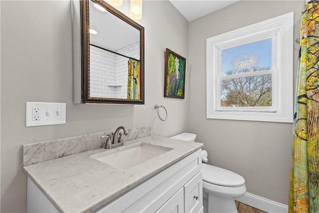 120 Columbia Heights Rd Unit 1, Charlestown, RI 02813 - full bath with vanity, baseboards, toilet, and a shower with curtain