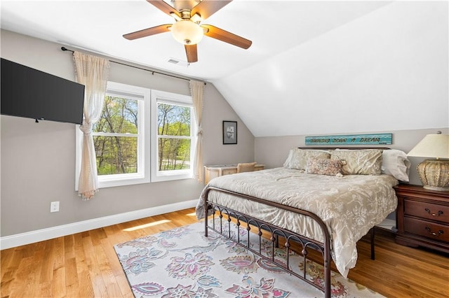 120 Columbia Heights Rd Unit 1, Charlestown, RI 02813 - bedroom featuring ceiling fan, visible vents, wood finished floors, baseboards, and lofted ceiling