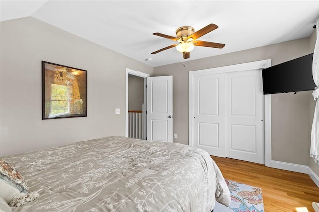 120 Columbia Heights Rd Unit 1, Charlestown, RI 02813 - bedroom with baseboards, a ceiling fan, a closet, and light wood-type flooring