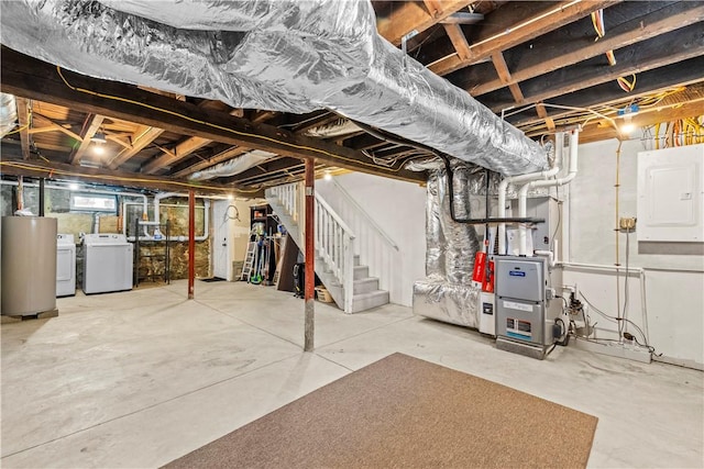 120 Columbia Heights Rd Unit 1, Charlestown, RI 02813 - below grade area featuring stairway, gas water heater, electric panel, and washer and clothes dryer