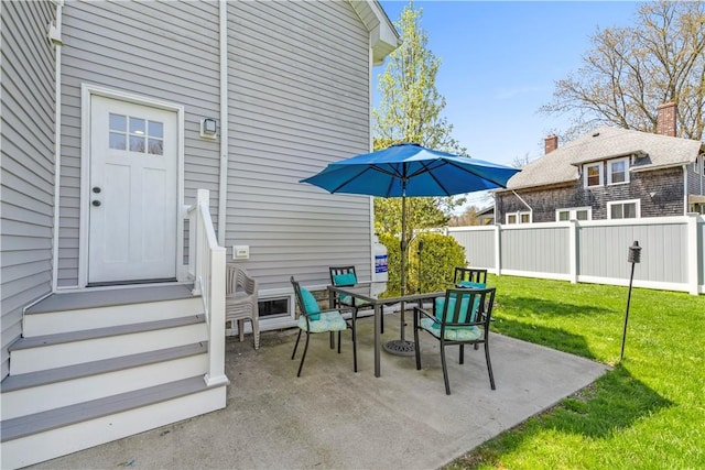 120 Columbia Heights Rd Unit 1, Charlestown, RI 02813 - view of patio / terrace featuring fence and outdoor dining area