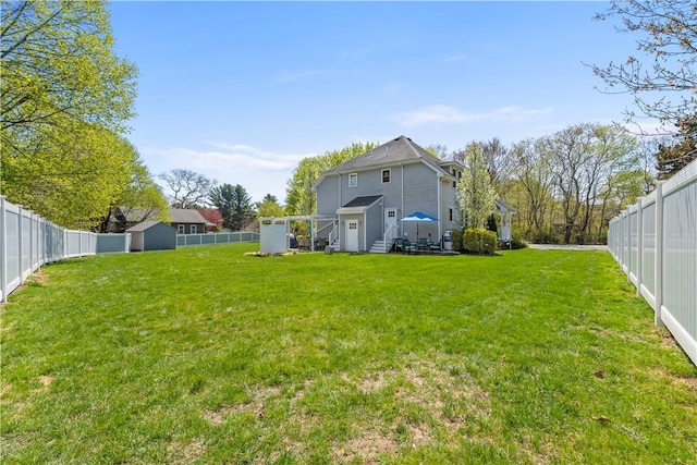 120 Columbia Heights Rd Unit 1, Charlestown, RI 02813 - view of yard with a fenced backyard, a shed, and an outbuilding