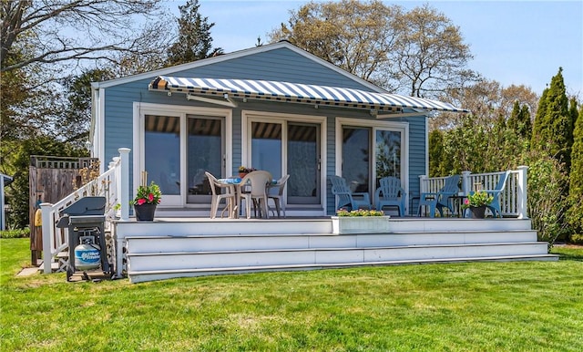 35 Buena Vista Dr, North Kingstown, RI 02852 - rear view of property featuring a yard and a wooden deck