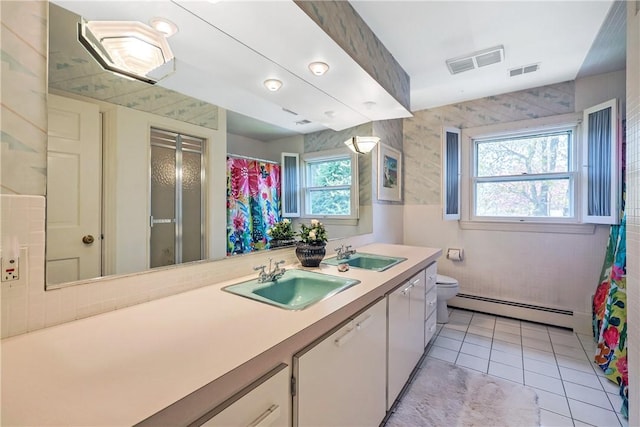 170 Summit Dr, Cranston, RI 02920 - bathroom with a baseboard heating unit, visible vents, and a sink