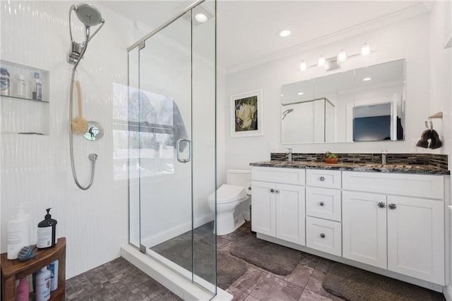 170 Summit Dr, Cranston, RI 02920 - full bathroom featuring a sink, toilet, ornamental molding, a stall shower, and double vanity