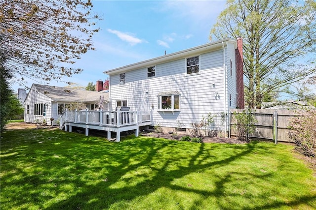 170 Summit Dr, Cranston, RI 02920 - rear view of property with a lawn, fence, a chimney, and a wooden deck