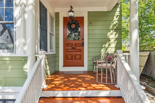 entrance to property with a porch