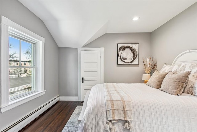 bedroom featuring baseboard heating, recessed lighting, baseboards, lofted ceiling, and dark wood-type flooring