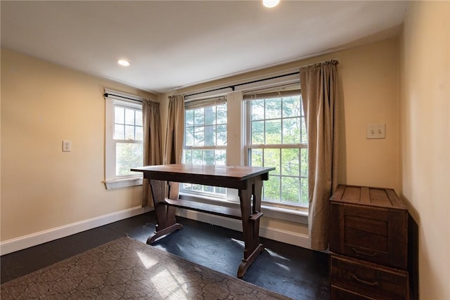 interior space featuring baseboards, recessed lighting, and a wealth of natural light