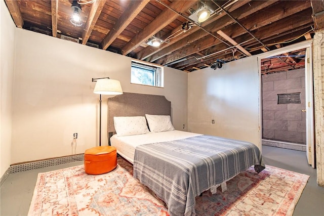 bedroom featuring visible vents and concrete floors