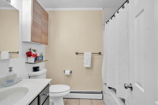 bathroom with tile patterned flooring, a baseboard heating unit, toilet, and vanity