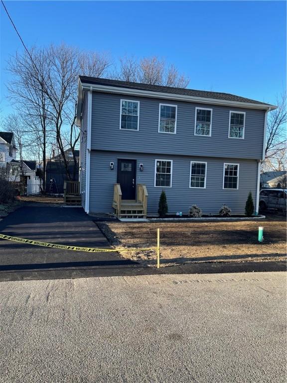 87 Dunedin St, Cranston, RI 02920 - colonial-style house with entry steps