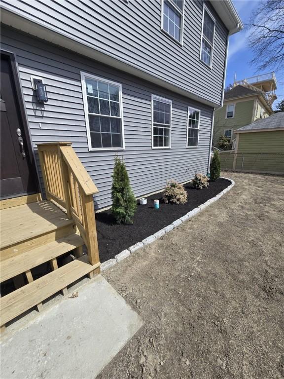 87 Dunedin St, Cranston, RI 02920 - view of side of property featuring fence