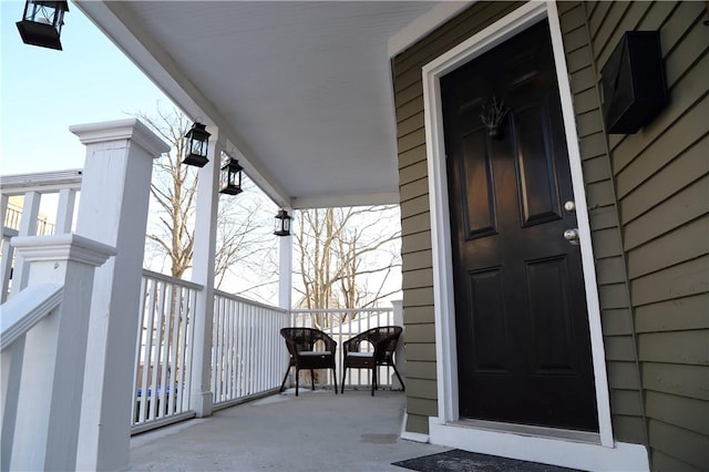 entrance to property with a porch