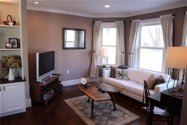 living area featuring dark wood-style flooring, baseboards, and recessed lighting