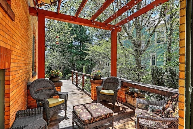 exterior space with wooden walls, a wall of windows, a wooden deck, and hardwood / wood-style flooring