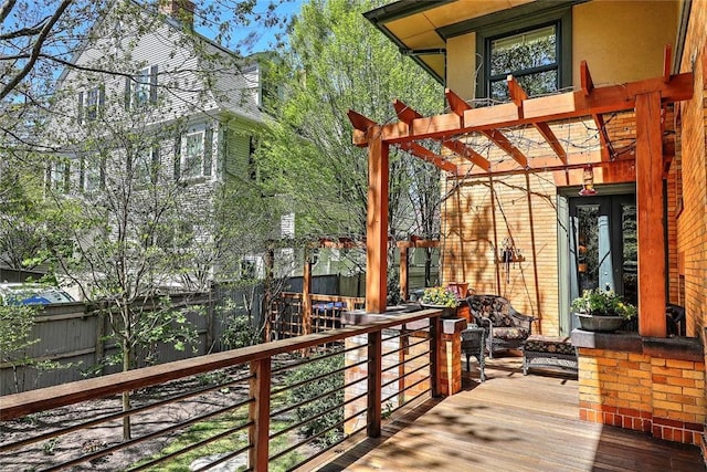 deck with a fenced backyard