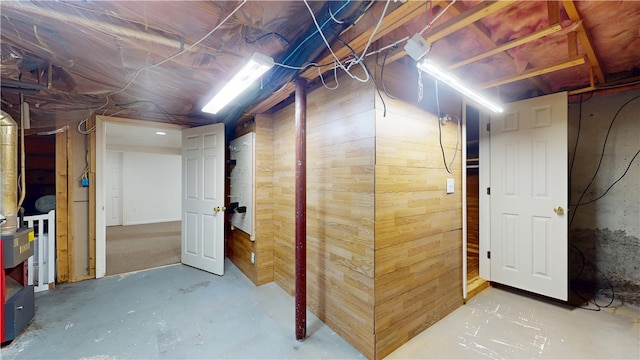 unfinished basement with wooden walls