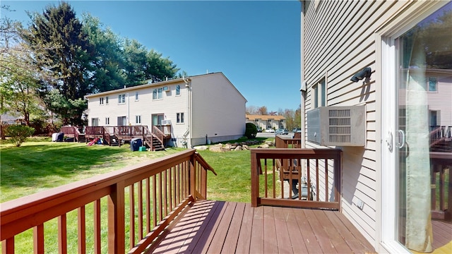 deck featuring a lawn