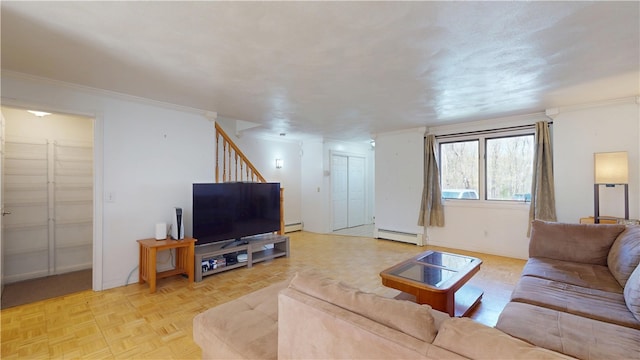 living room with crown molding, a baseboard heating unit, and stairway