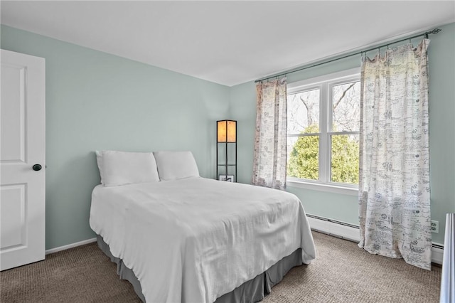 carpeted bedroom with baseboard heating