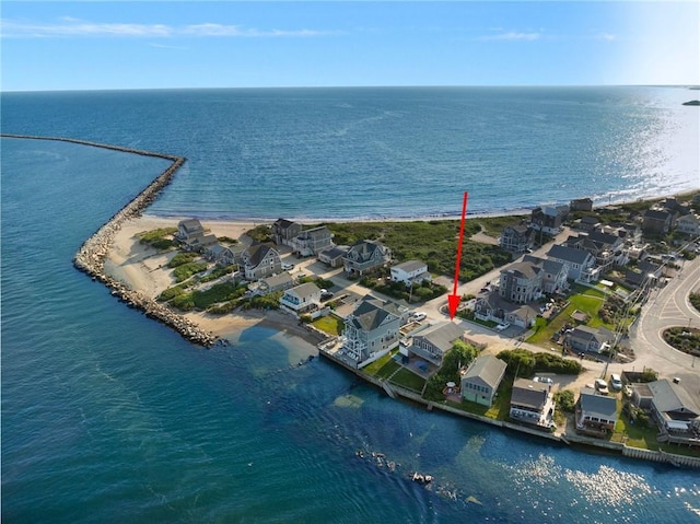 bird's eye view featuring a water view and a residential view