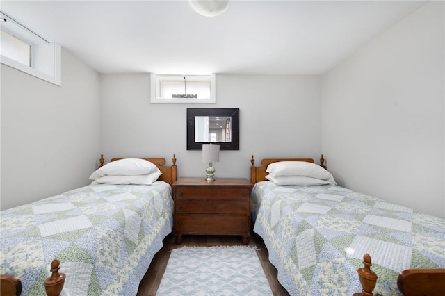 bedroom featuring wood finished floors