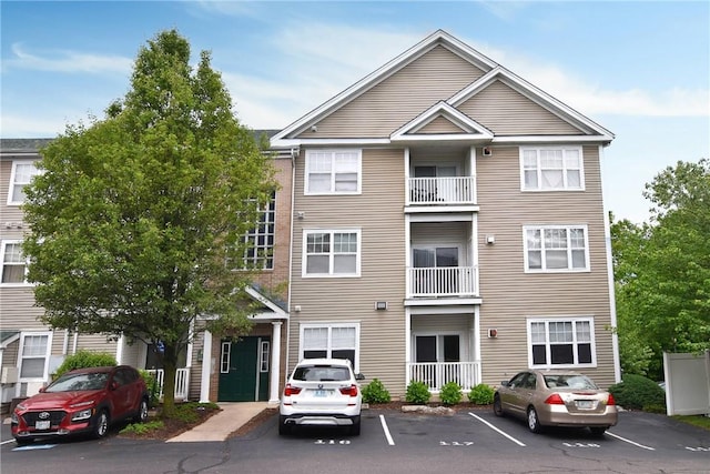 112 Mill St Unit 102, Woonsocket, RI 02895 - view of building exterior featuring uncovered parking