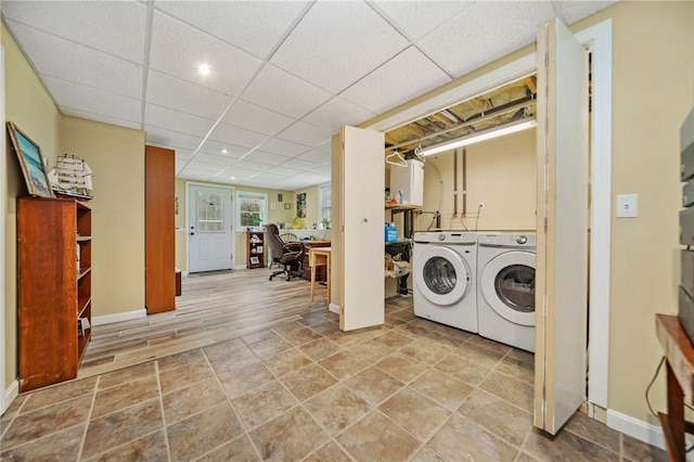 laundry room featuring laundry area, washer and clothes dryer, baseboards, and recessed lighting