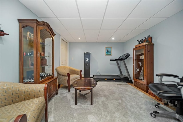 interior space with recessed lighting, a paneled ceiling, and carpet floors