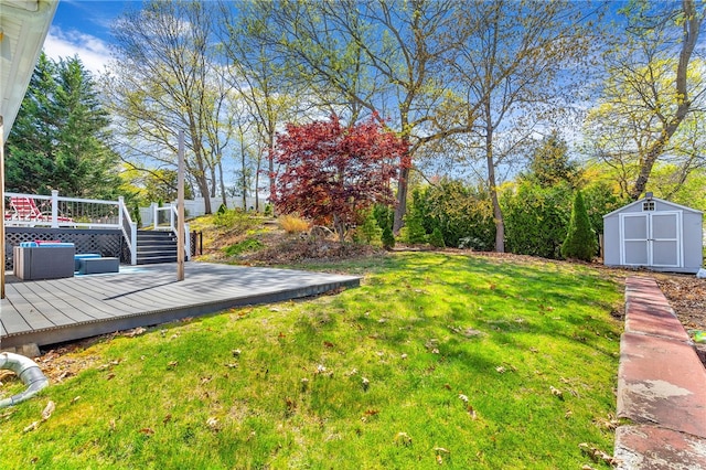 105 Quaker Dr, West Warwick, RI 02893 - view of yard featuring a storage unit, a wooden deck, and an outdoor structure