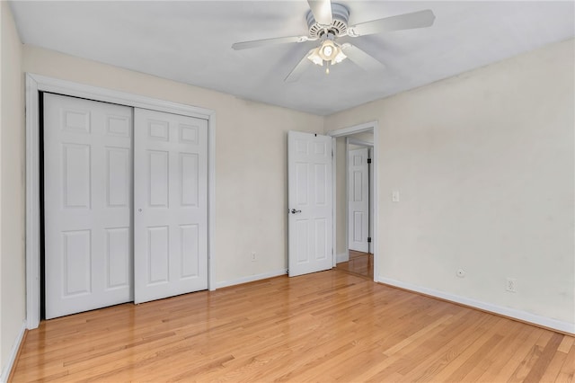 105 Quaker Dr, West Warwick, RI 02893 - unfurnished bedroom with light wood-style flooring, baseboards, a closet, and a ceiling fan