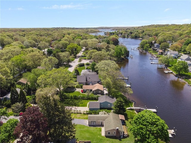 106 N River Dr, Narragansett, RI 02882 - aerial view of residential area with a large body of water and a heavily wooded area