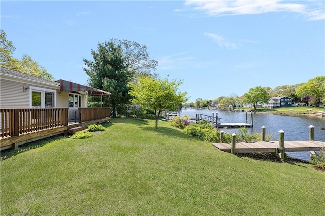 106 N River Dr, Narragansett, RI 02882 - view of grassy yard featuring a boat dock and a water view