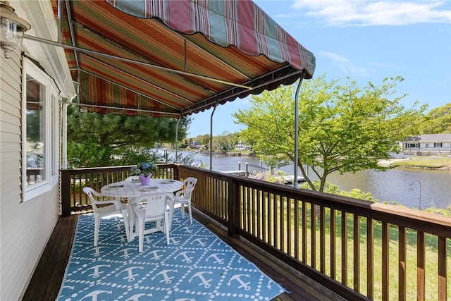 106 N River Dr, Narragansett, RI 02882 - wooden terrace featuring a water view and outdoor dining area