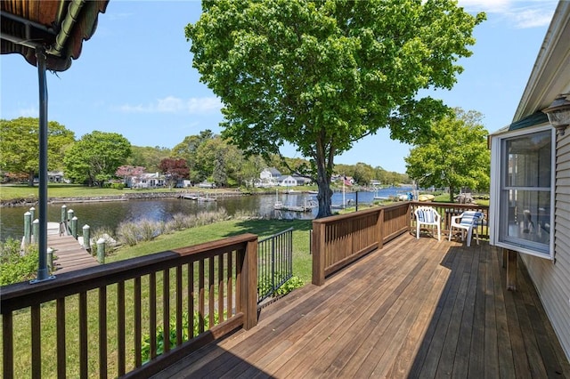 106 N River Dr, Narragansett, RI 02882 - deck with a water view and a lawn