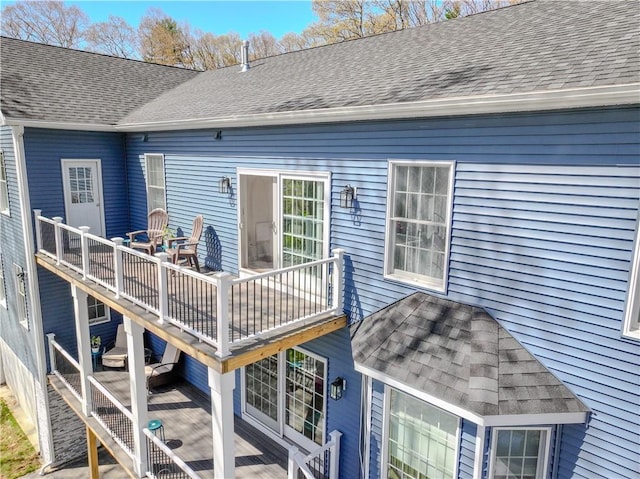 70 Shady Ln, Burrillville, RI 02859 - rear view of house featuring roof with shingles and a deck