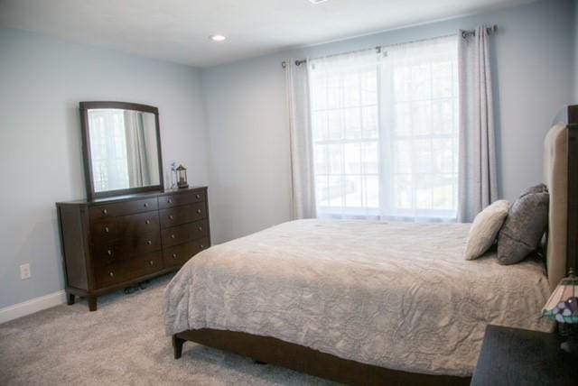 70 Shady Ln, Burrillville, RI 02859 - bedroom featuring multiple windows, carpet flooring, and baseboards
