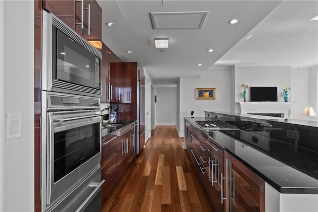 1 Tower Dr Unit 1502, Portsmouth, RI 02871 - kitchen featuring visible vents, black microwave, dark wood-style floors, stainless steel oven, and recessed lighting