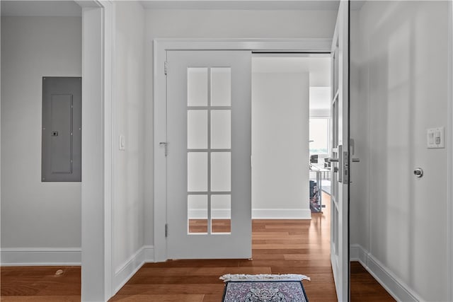 1 Tower Dr Unit 1502, Portsmouth, RI 02871 - doorway featuring baseboards, wood finished floors, and electric panel