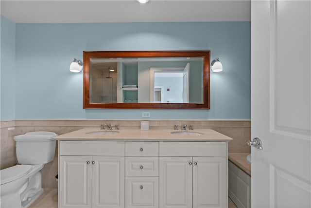 1 Tower Dr Unit 1502, Portsmouth, RI 02871 - full bath with a sink, wainscoting, and tile walls