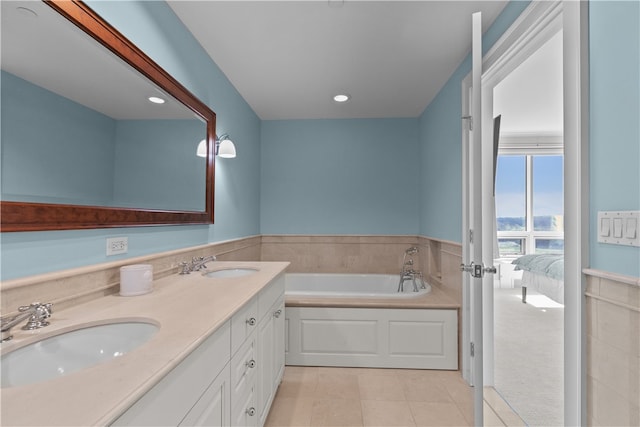 1 Tower Dr Unit 1502, Portsmouth, RI 02871 - bathroom with a bath, double vanity, a sink, and tile patterned flooring