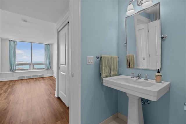 1 Tower Dr Unit 1502, Portsmouth, RI 02871 - bathroom with visible vents, baseboards, and wood finished floors