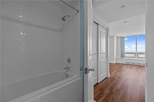 1 Tower Dr Unit 1502, Portsmouth, RI 02871 - full bath with baseboards, wood finished floors, and shower / washtub combination