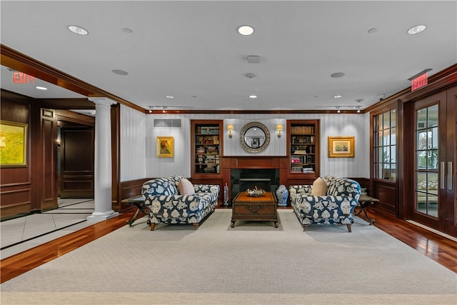 1 Tower Dr Unit 1502, Portsmouth, RI 02871 - living area featuring crown molding, ornate columns, recessed lighting, and wood finished floors